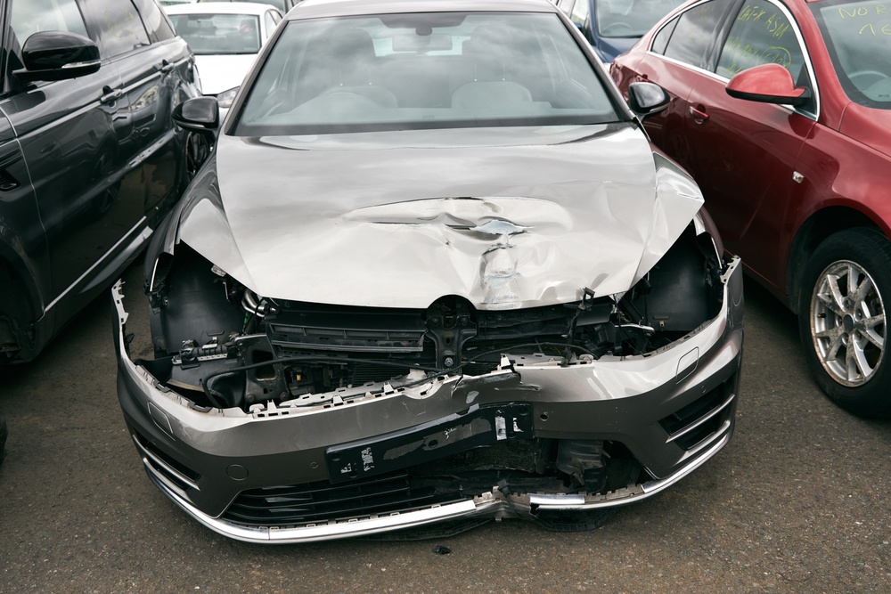badly-damaged-right-off-in-car-recycling-or-insura-2024-12-05-16-12-56-utc (1)